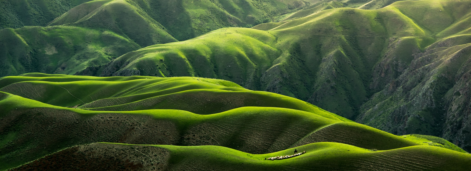 Misty green mountains along the southern Spanish coastline at dawn