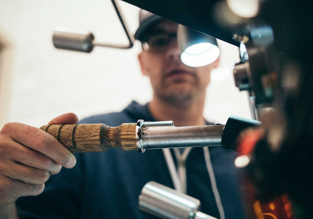 Artisan working with fine tools, close macro detail